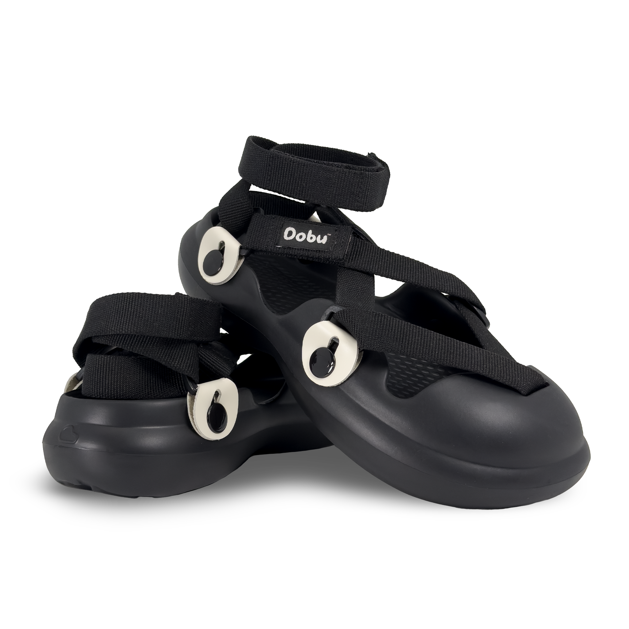 Scarpa sabot nera con pelle bianca e nastri neri, stile ispirato ai panda e suola barefoot in EVA