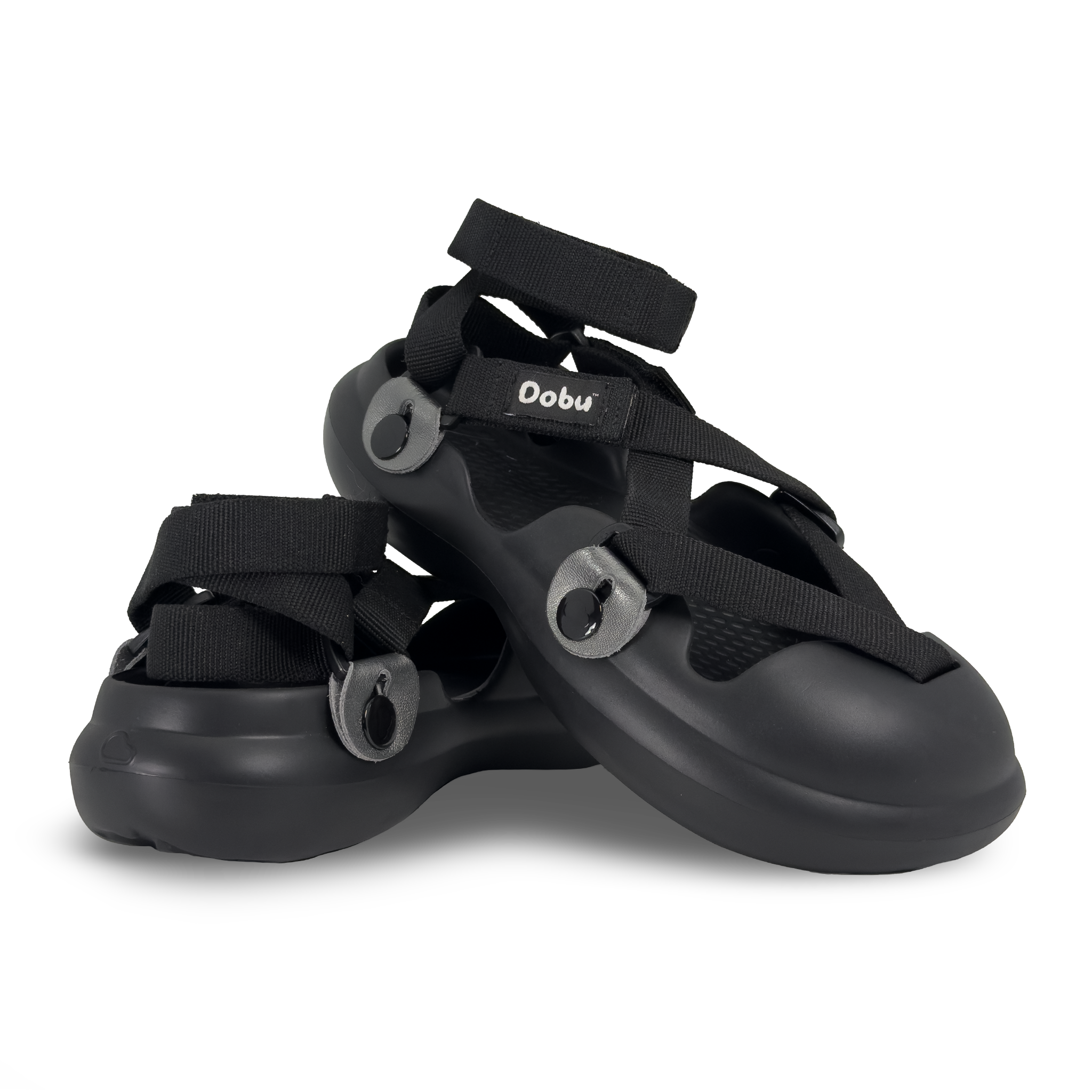 Scarpa DOBU Lo-Li-Ta Chic Glock con scafo nero, nastri neri incrociati e componenti in pelle argentata. Vista frontale e laterale del modello.